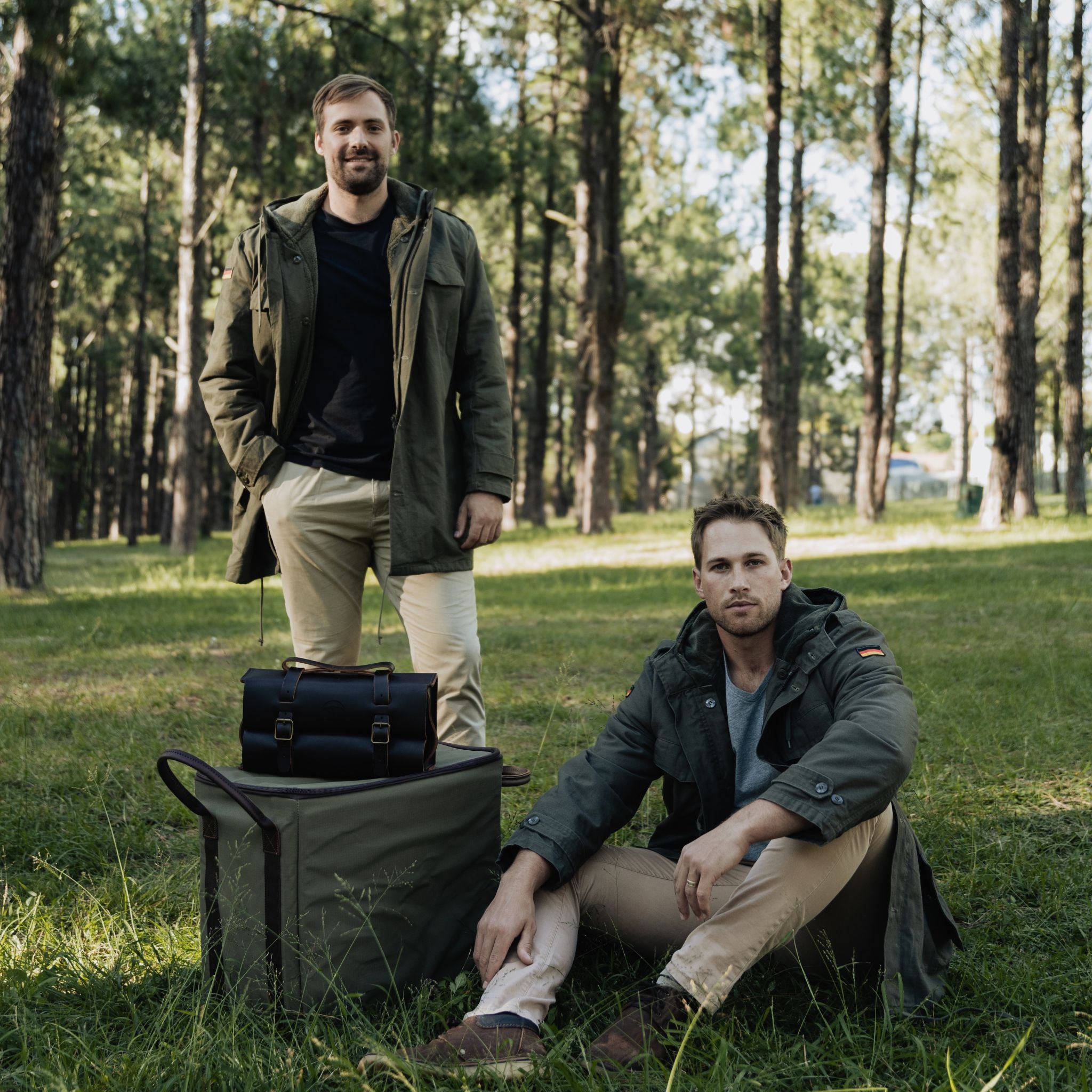 Two guys wearing original german military parkas