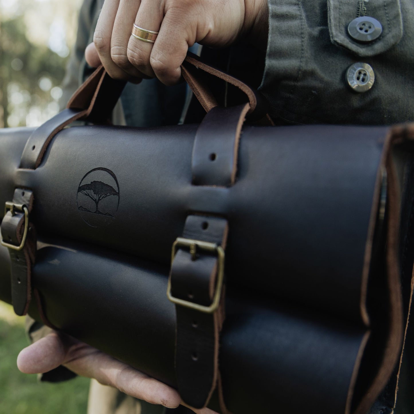 Dark brown leather whiskey bag