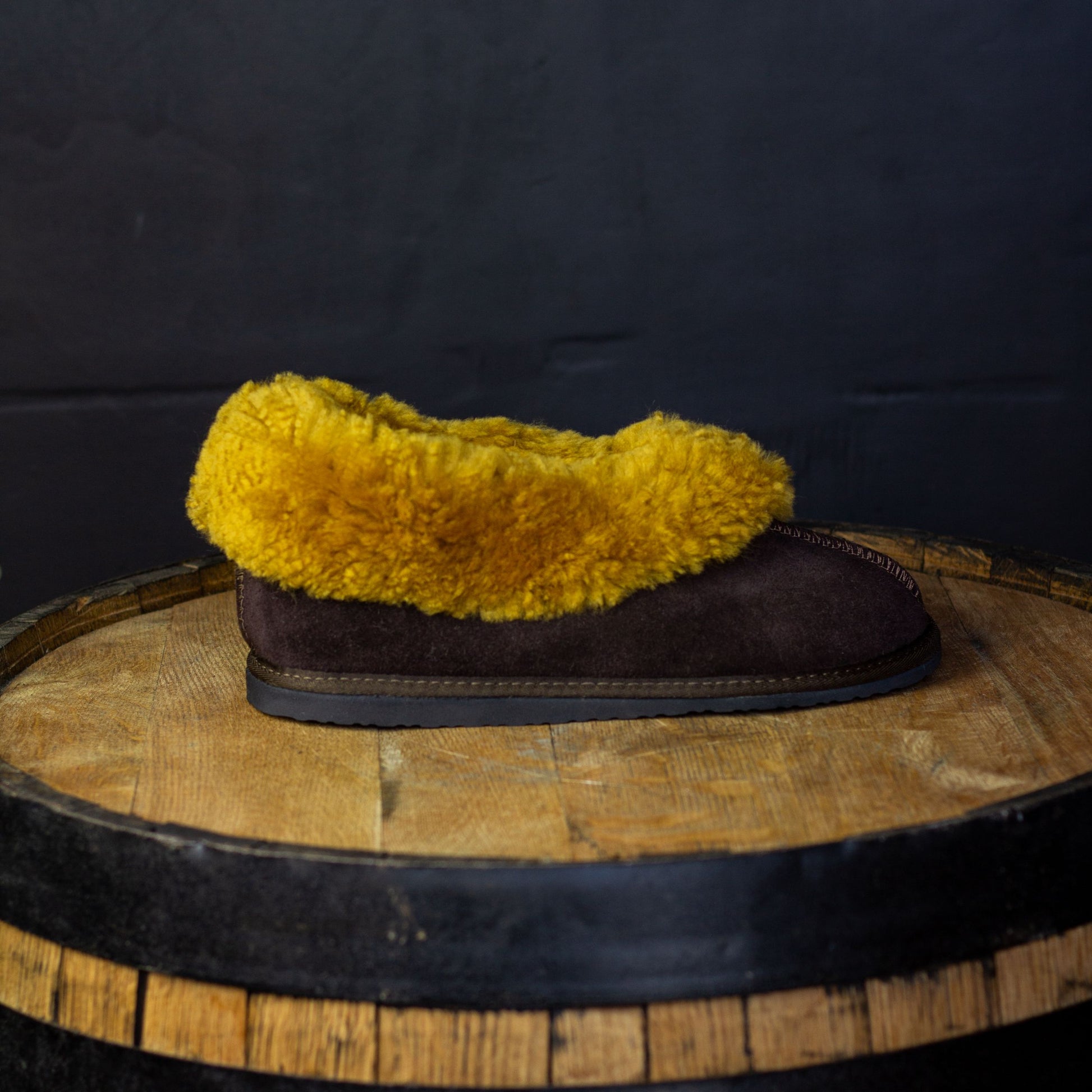 gold and brown sheepskin slippers with rubber sole