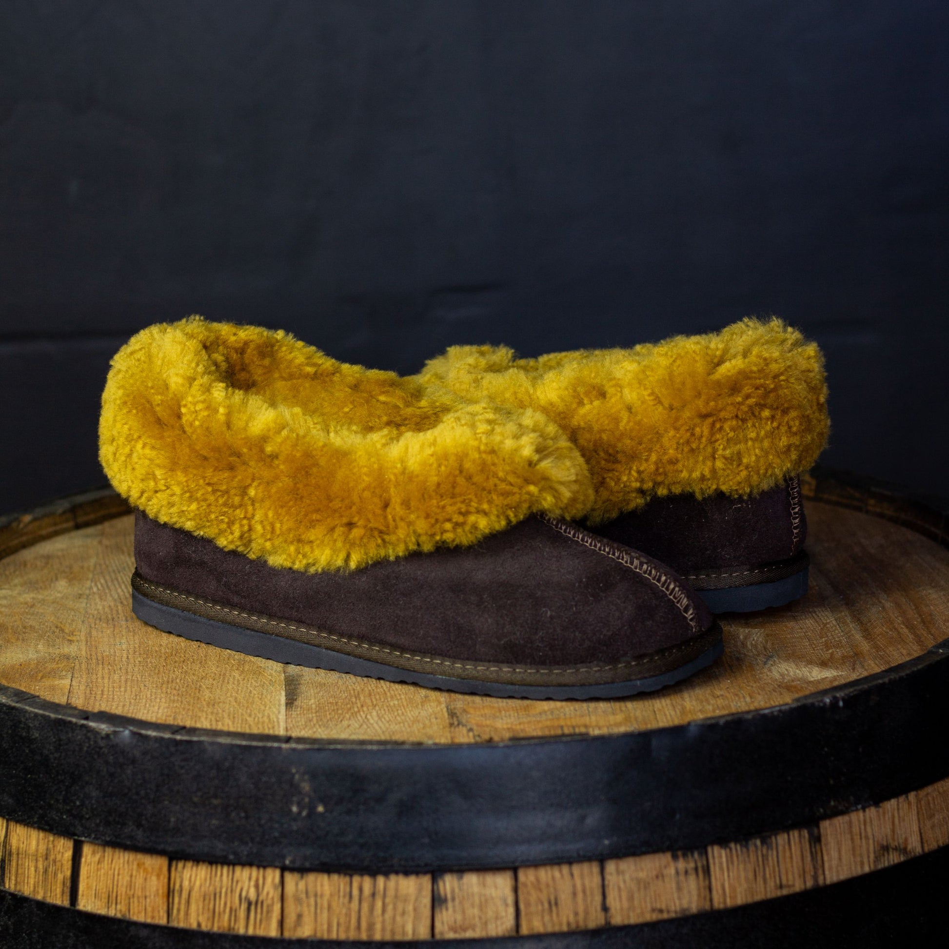gold and brown sheepskin slippers with rubber sole